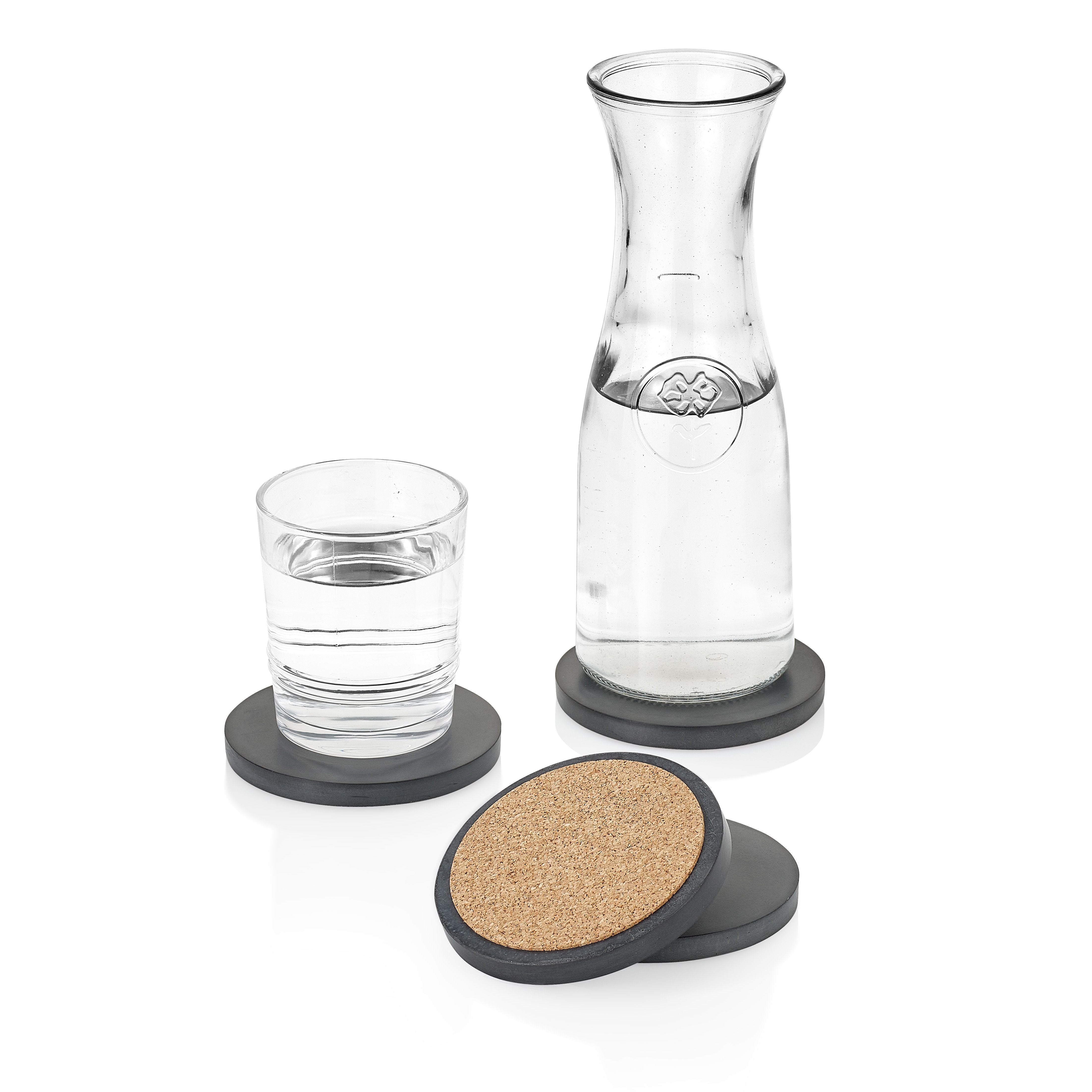 Clear glass carafe and glass with cork coasters on a white background. Henderson Garden Supply