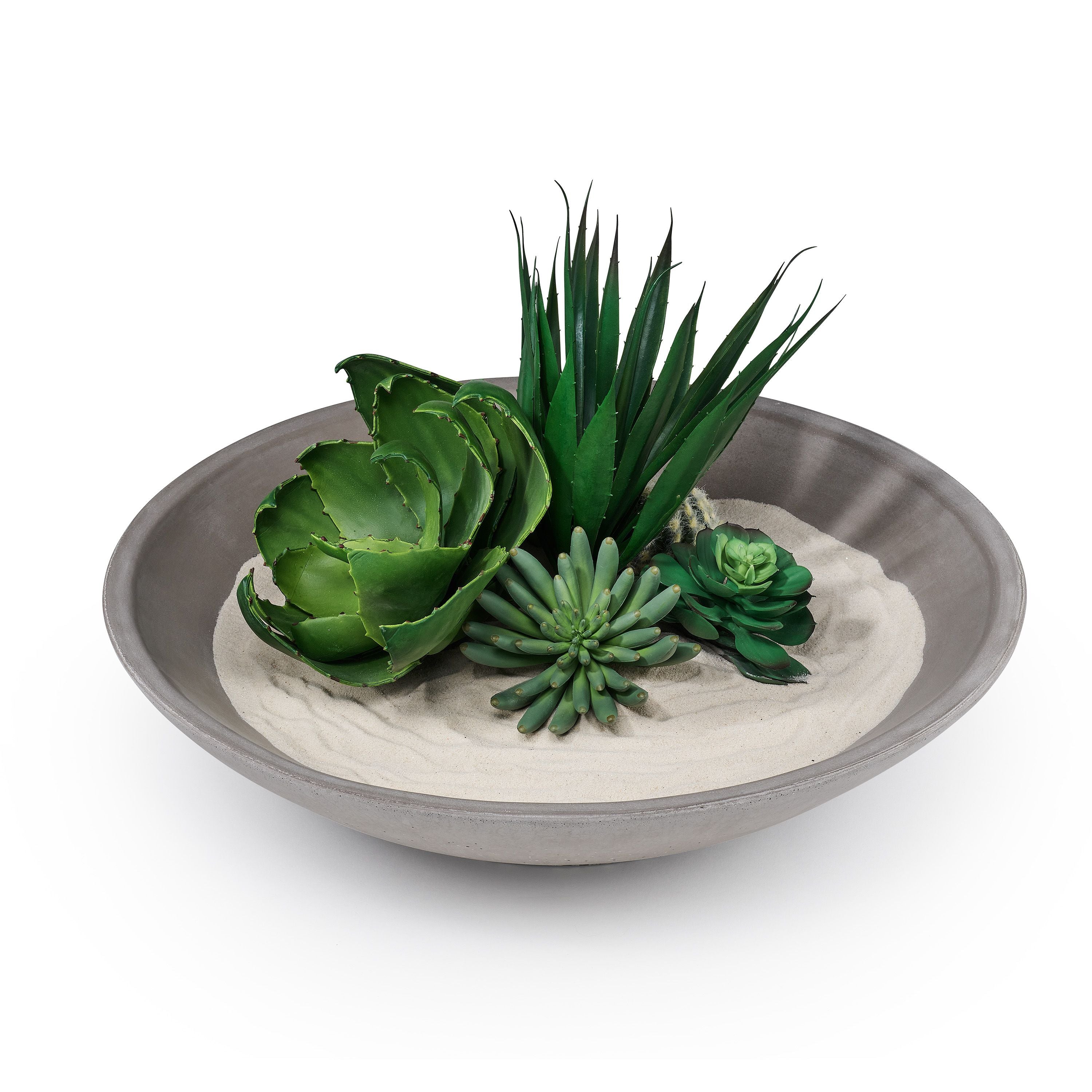 Decorative bowl with artificial succulents on a white background. Henderson Garden Supply