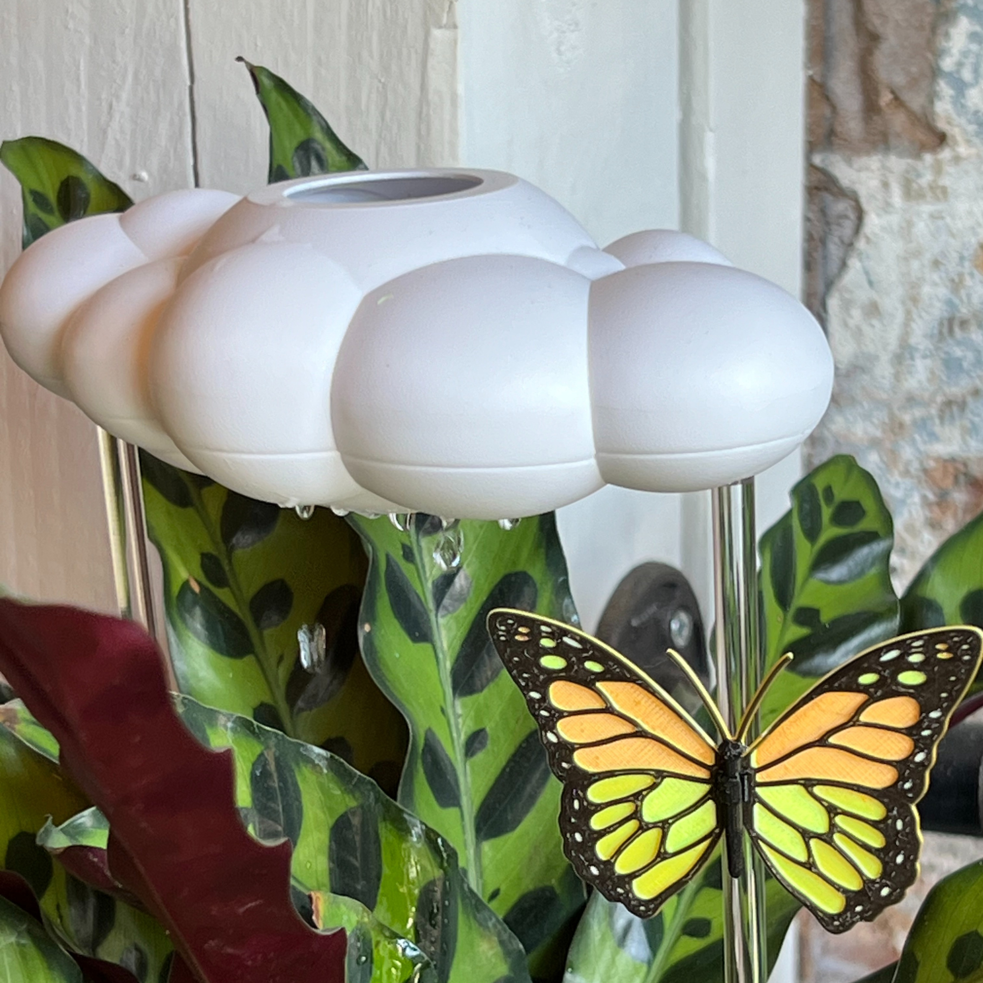 Dripping Rain Cloud with Orange Butterfly Charm
