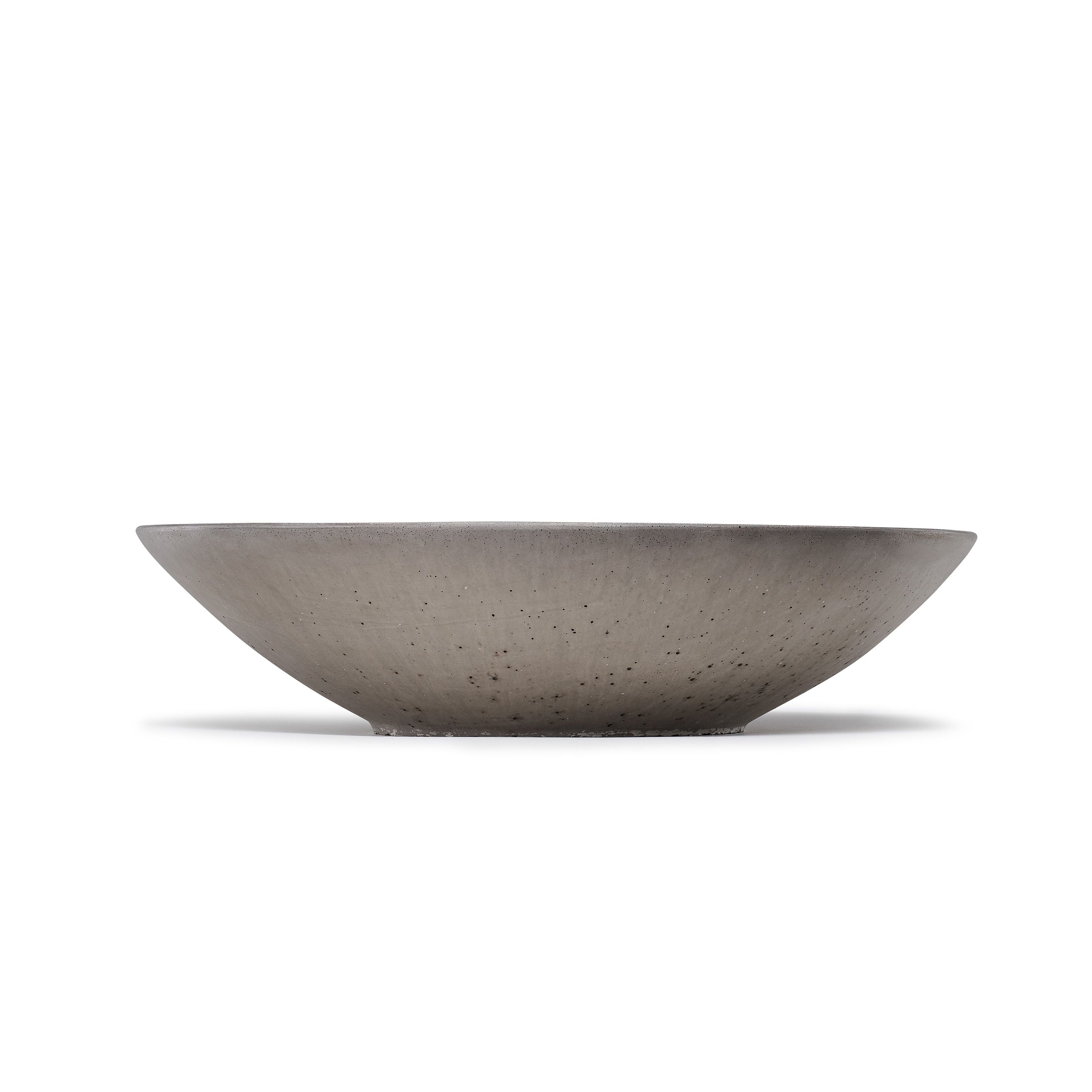 Concrete bowl on a white background.  Henderson Garden Supply
