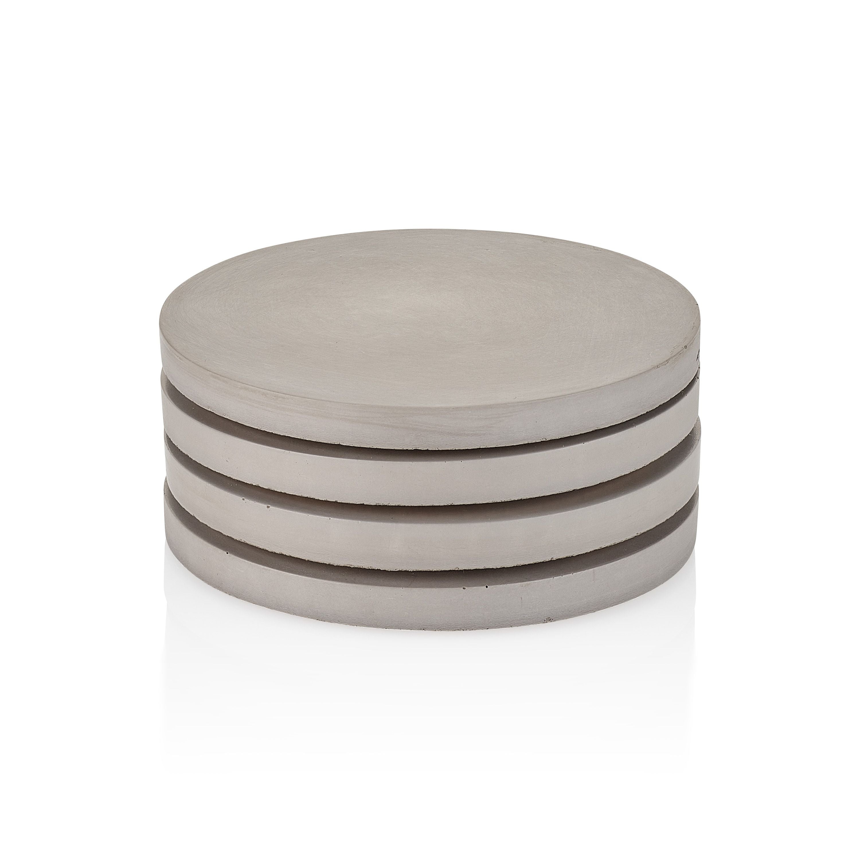 Stack of three round concrete coasters on a white background.  Henderson Garden Supply