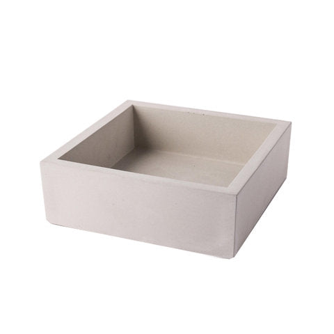 Rectangular concrete napkin holder on a white background.  Henderson Garden Supply