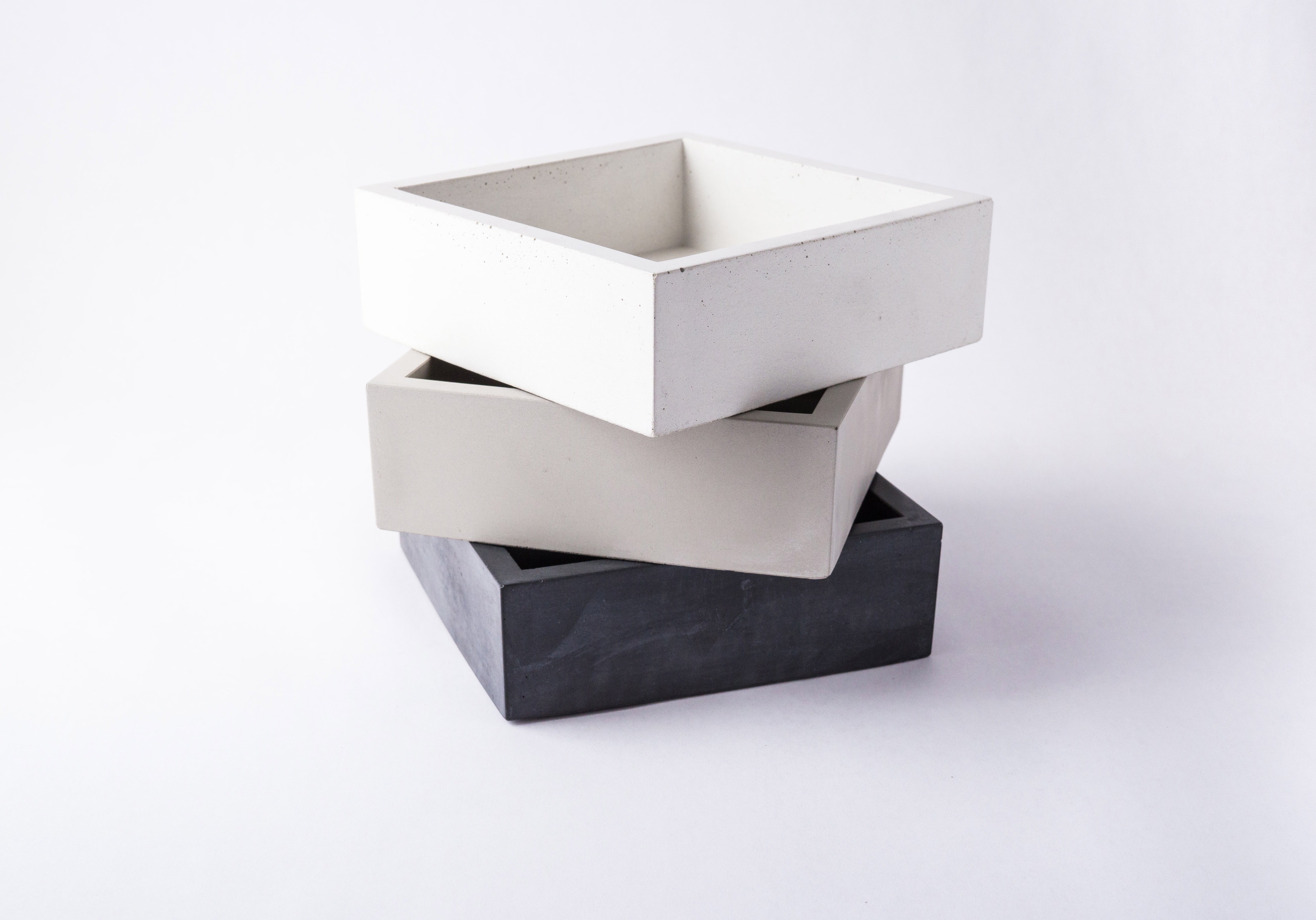 Modern black and white geometric sculpture on a white background.  Napkin Holder - Henderson Garden Supply