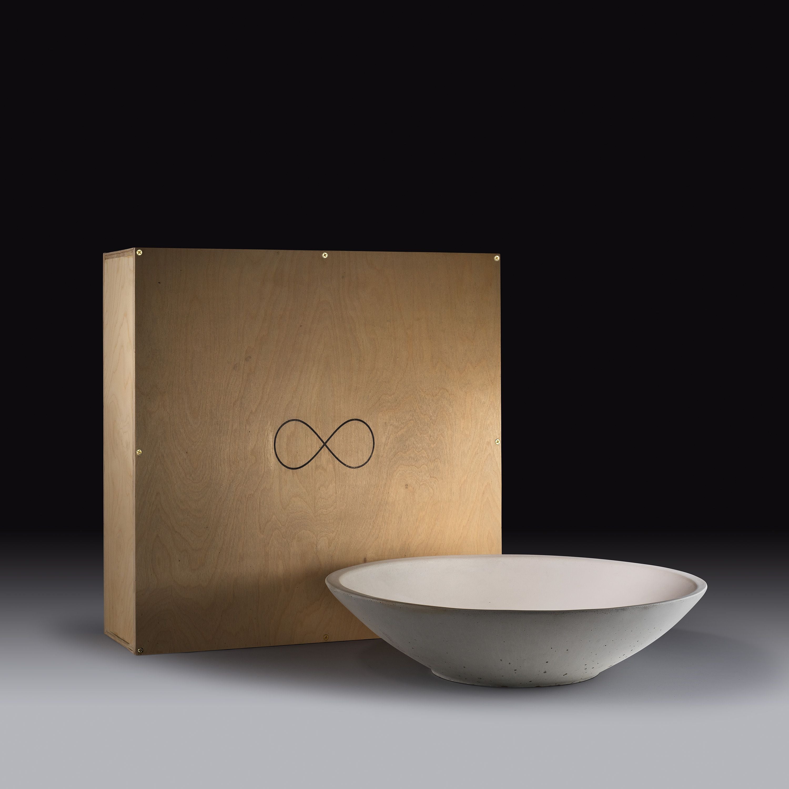 Concrete bowl on a gradient background.  Henderson Garden Supply