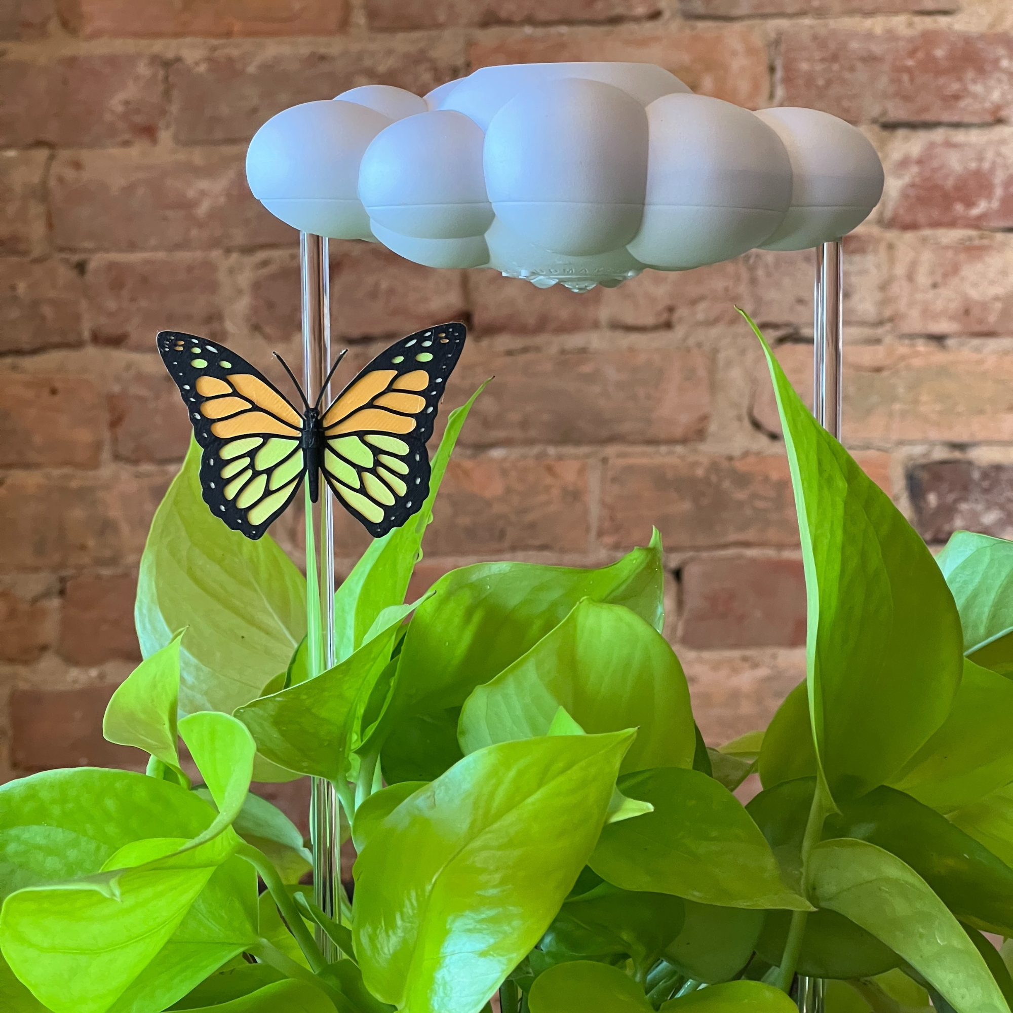 Dripping Rain Cloud with Orange Butterfly Charm