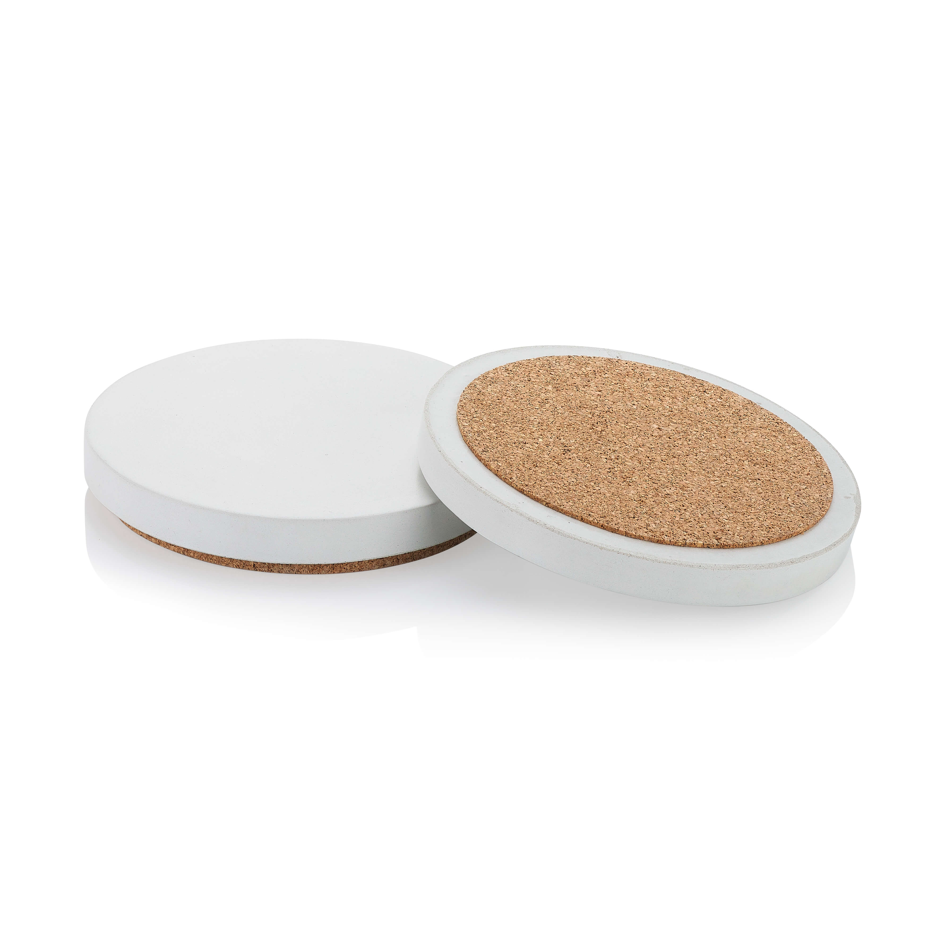 Two round white coasters with cork bottoms on a white background.  Henderson Garden Supply