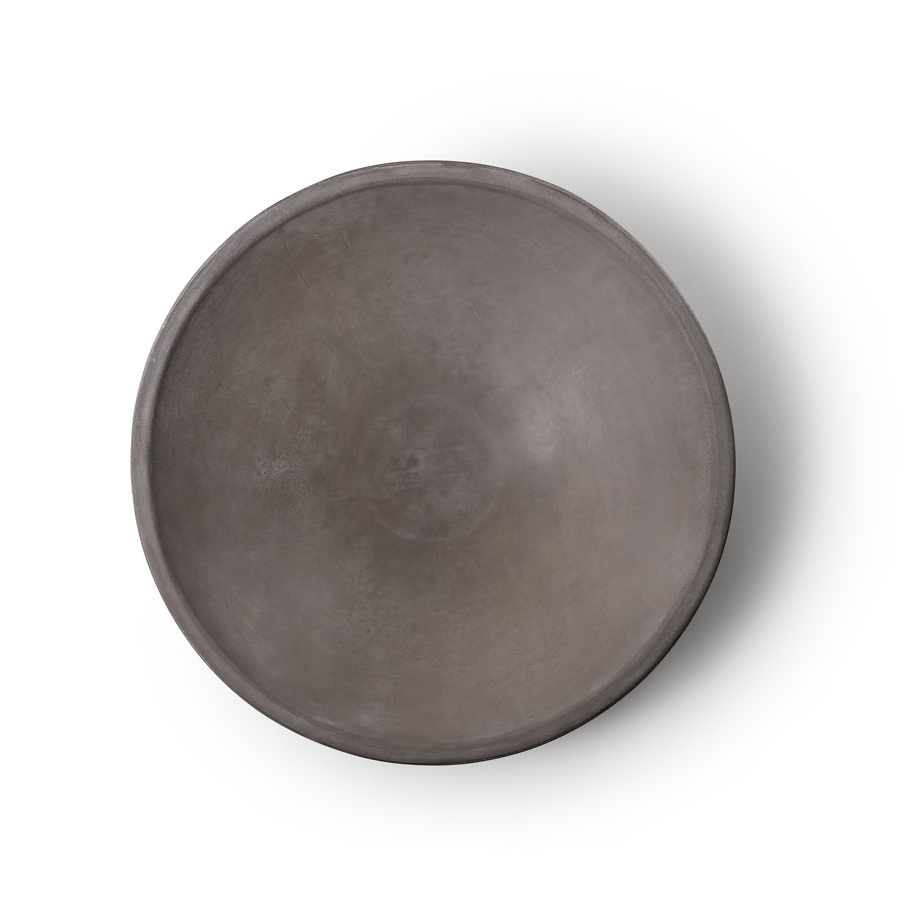 Round dark gray stone bowl on a white background.  Henderson Garden Supply