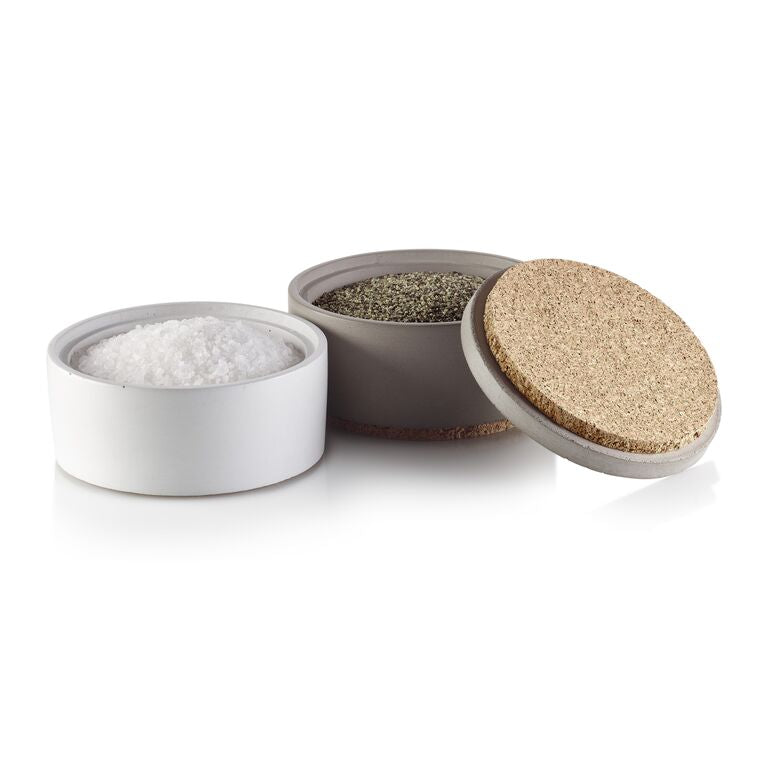 Three small containers with lids, each containing different types of spices or seasonings on a white background.  Henderson Garden Supply