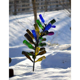 Wine Bottle Tree shown in snowy background - Henderson Garden Supply