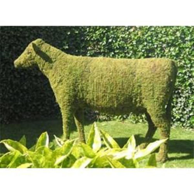 Cow Steel Topiary Frame filled with sphagnum moss pictured in a garden - Henderson Garden Supply