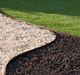 Core Edge Flexible Steel Lawn Edging show in Brown edging dividing grass from gravel path - Henderson Garden Supply